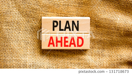 Plan ahead symbol. Concept word Plan ahead on beautiful wooden blocks. Beautiful canvas background. Business plan ahead concept. Copy space. 131718673