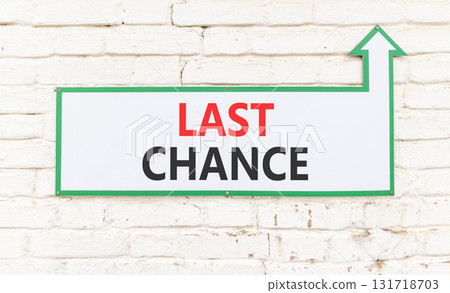 Last chance symbol. Concept word Last chance on beautiful white sign on white brick wall. Beautiful white brick wall background. Business last chance concept. Copy space. 131718703