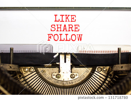 Like share follow symbol. Concept words Like Share Follow typed on beautiful old retro vintage typewriter. Beautiful white background. Business like share follow concept. Copy space. Like share follow symbol. Concept words Like Share Follow typed on beautiful old retro vintage typewriter. Beautiful white background. Business like share follow concept. Copy space. 131718780