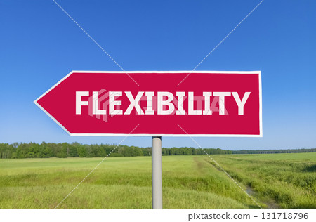 Flexibility symbol. Concept word Flexibility on beautiful red road sign. Beautiful blue sky green grass and forest peaceful nature background. Business flexibility concept. Copy space. Flexibility symbol. Concept word Flexibility on beautiful red road sign. Beautiful blue sky green grass and forest peaceful nature background. Business flexibility concept. Copy space. 131718796