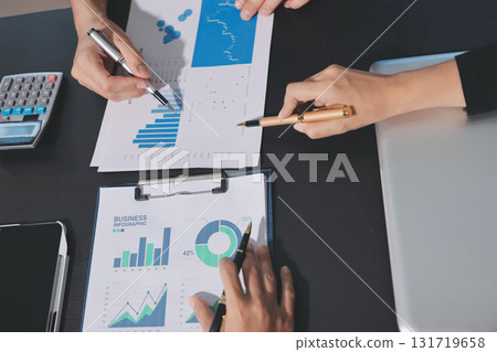 Accounting company provide finance and taxation planning for profitable cash flow, Auditor and accountant team working in office, analyze financial data and accounting record with calculator.Insight 131719658