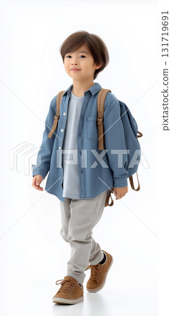Elementary school boy walking in casual clothes with a backpack Elementary school boy walking in casual clothes with a backpack 131719691