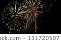 Fireworks illuminating the night sky 131720597