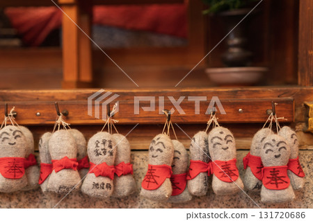 A cute Jizo statue that is loved by the common people and watches over the area. 131720686