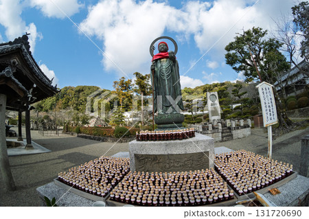 A cute Jizo statue that is loved by the common people and watches over the area. 131720690
