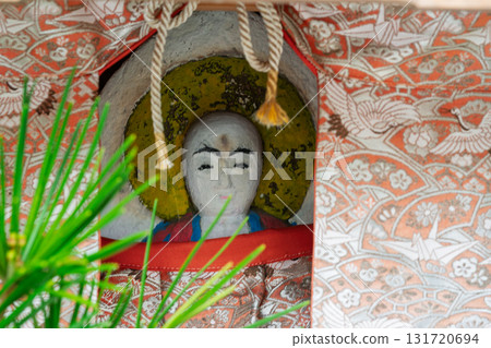 A cute Jizo statue that is loved by the common people and watches over the area. A cute Jizo statue that is loved by the common people and watches over the area. 131720694