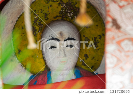 A cute Jizo statue that is loved by the common people and watches over the area. 131720695