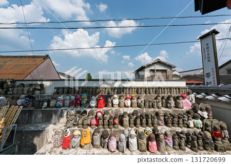 A cute Jizo statue that is loved by the common people and watches over the area. A cute Jizo statue that is loved by the common people and watches over the area. 131720699