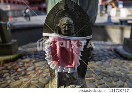 A cute Jizo statue that is loved by the common people and watches over the area. 131720717