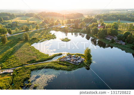 view from above of ancient wooden settlement on river island, recontruction of ancient architecture view from above of ancient wooden settlement on river island, recontruction of ancient architecture 131720822