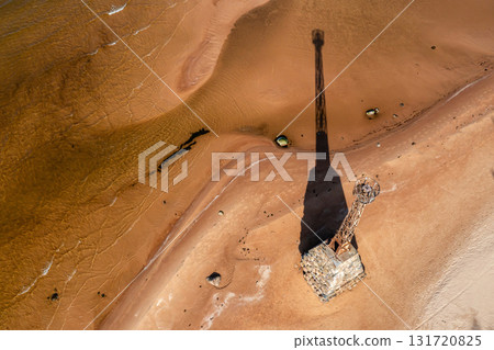abandoned ruins of Kurmrags lighthouse on the Baltic coast, Latvia, view from above 131720825