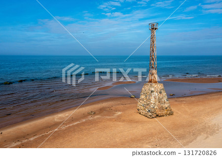 old ruins of Kurmrags Lighthouse on the shore of the Rigas Gulf, Baltic sea, Latvia 131720826