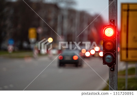 traffic light on the street junction with beautiful bokeh, city with cars in the background traffic light on the street junction with beautiful bokeh, city with cars in the background 131720891
