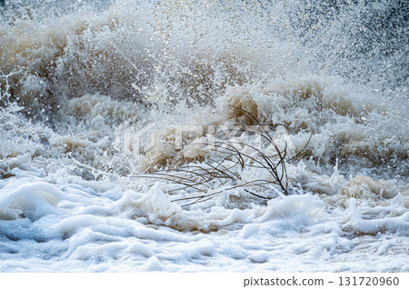 close up of flowing water, rapid water splashes of an white water river or stream, bubbly water close up of flowing water, rapid water splashes of an white water river or stream, bubbly water 131720960