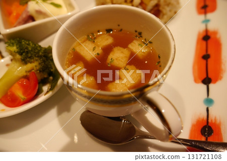 Consommé soup in a cup 131721108