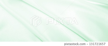 Smooth elegant green silk or satin luxury cloth texture as abstract background. Luxurious background design Smooth elegant green silk or satin luxury cloth texture as abstract background. Luxurious background design 131721657