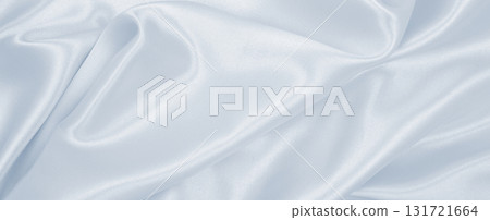 Smooth elegant grey silk or satin luxury cloth as wedding background. Luxurious Christmas background or New Year background design Smooth elegant grey silk or satin luxury cloth as wedding background. Luxurious Christmas background or New Year background design 131721664