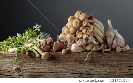 Fresh shimeji mushrooms with thyme and garlic. Fresh shimeji mushrooms with thyme and garlic. 131721934