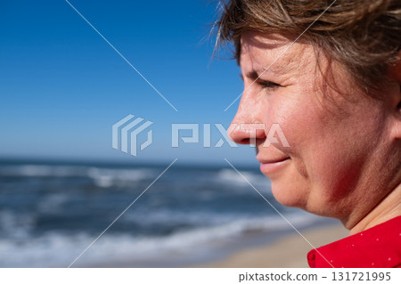 Woman with double chin during holiday 131721995