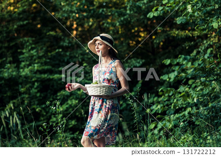 A young girl near a pink rug 131722212