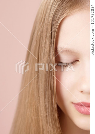 Half face portrait of a calm teenage girl with closed eyes, smooth skin and natural beauty. Concept of gentle skincare, mindfulness, wellness, kids cosmetics and emotional balance. Self care Gen Alpha Half face portrait of a calm teenage girl with closed eyes, smooth skin and natural beauty. Concept of gentle skincare, mindfulness, wellness, kids cosmetics and emotional balance. Self care Gen Alpha 131722854