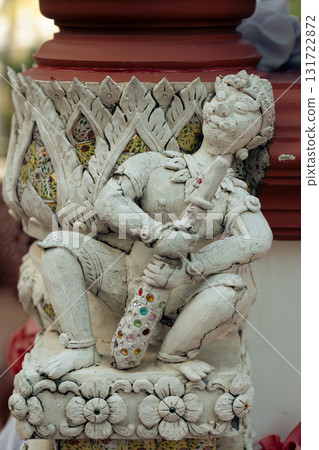 Giant statue at Tha Mai temple, Thailand with intricate traditional design Giant statue at Tha Mai temple, Thailand with intricate traditional design 131722872