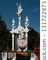 Giant statue and cement pole at Tha Mai temple, Thailand 131722873
