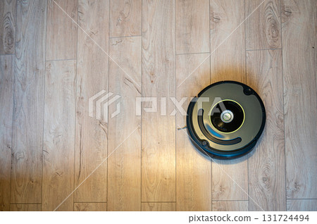 automate robot vacuum clean floor technology for help housewife concept 131724494