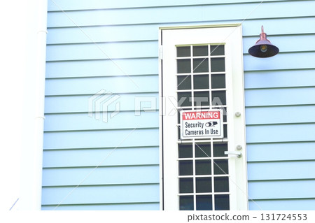 Back door, outdoor light and wooden wall Back door, outdoor light and wooden wall 131724553