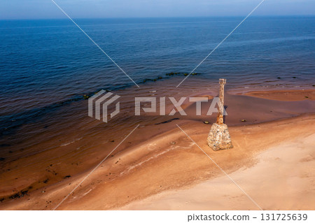 old ruins of Kurmrags Lighthouse on the shore of the Rigas Gulf, Baltic sea, Latvia 131725639