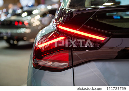 closeup of a red led taillight on a modern car, detail on the rear light of a car closeup of a red led taillight on a modern car, detail on the rear light of a car 131725769