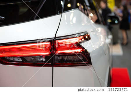 closeup of a red led taillight on a modern car, detail on the rear light of a car 131725771