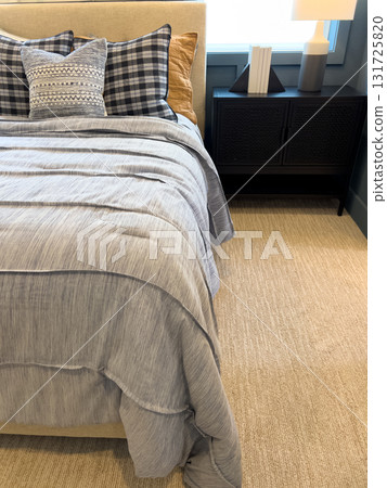 A textured two-tone blue accent wall with white trim and a power outlet at the bottom. Great for renovation, paint, or interior design themes. 131725820