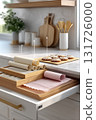 Infographic showing parchment rolled and stacked, and silicone mats stored flat in drawer, arrows and text labels, white kitchen counter background, soft minimal visuals, organized tools around --ar 2 131726000