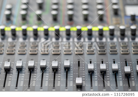 Sound and audio mixer control panel with buttons and sliders. Audio sound mixer console. Audio mixer 131726095