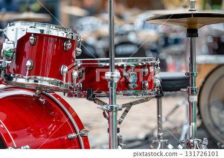 A set of plates in a drum set. At a concert of percussion music, selective focus, closeup 131726101
