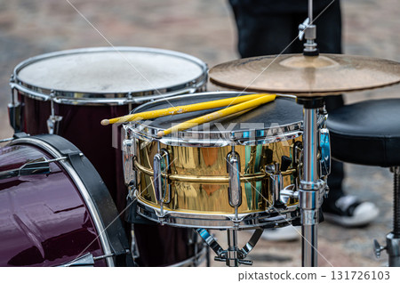 A set of plates in a drum set. At a concert of percussion music, selective focus, closeup A set of plates in a drum set. At a concert of percussion music, selective focus, closeup 131726103