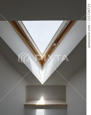 Skylight view in a minimalist room with natural light streaming in 131726723
