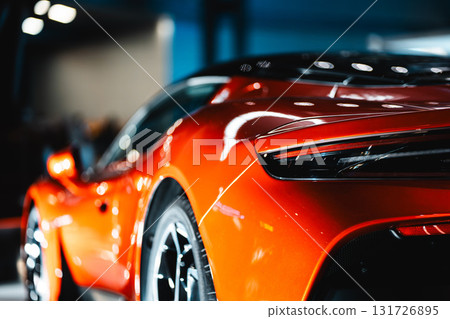 Stunning Red Sports Car Rear View in Showroom Display, Elegant Crimson Performance Vehicle Backside at Exhibition Showcase Stunning Red Sports Car Rear View in Showroom Display, Elegant Crimson Performance Vehicle Backside at Exhibition Showcase 131726895