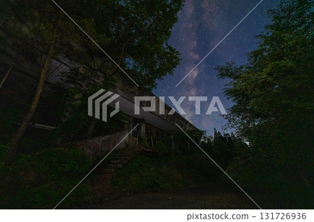Abandoned hotel in the mountains and starry sky Abandoned hotel in the mountains and starry sky 131726936