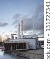 Modern Biogas Plant Facility in Denmark with Industrial buildings and chimneys Modern Biogas Plant Facility in Denmark with Industrial buildings and chimneys 131727341