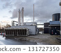 Modern Biogas Plant Facility in Denmark with Industrial buildings and Pipes Modern Biogas Plant Facility in Denmark with Industrial buildings and Pipes 131727350