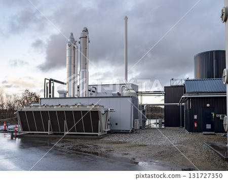 Modern Biogas Plant Facility in Denmark with Industrial buildings and Pipes Modern Biogas Plant Facility in Denmark with Industrial buildings and Pipes 131727350
