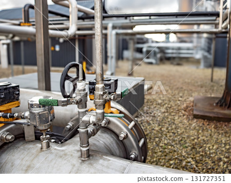 Modern Biogas Plant Facility in Denmark with Industrial Pipes and valves Modern Biogas Plant Facility in Denmark with Industrial Pipes and valves 131727351