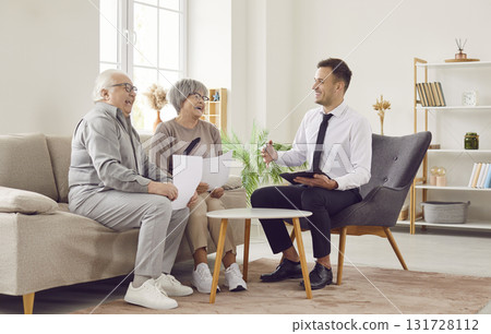 Senior couple having consultation with financial advisor about health insurance. Senior couple having consultation with financial advisor about health insurance. 131728112