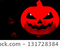 Plastic Pumpkin carved into spooky demon face for haloween 131728384