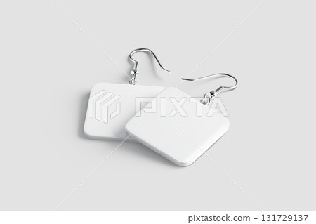 Blank white square earring pair mockup lying, grey background 131729137
