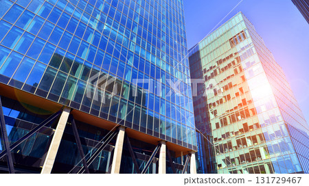 Bottom up view of  modern glass office building. Commercial real estate. New commercial office building in modern city. 131729467