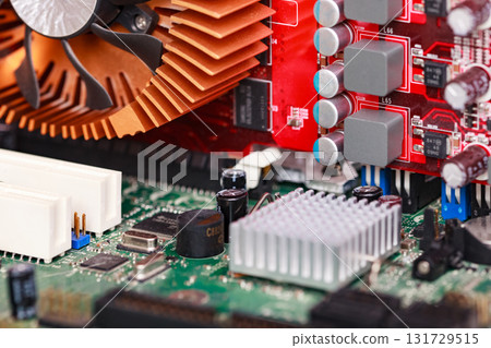 Closeup shot of modern motherboard and videocard Closeup shot of modern motherboard and videocard 131729515