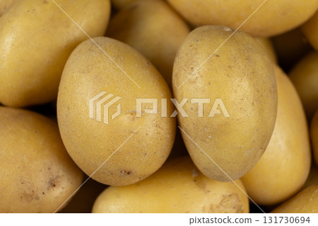 Fresh raw unpeeled potatoes close-up 131730694